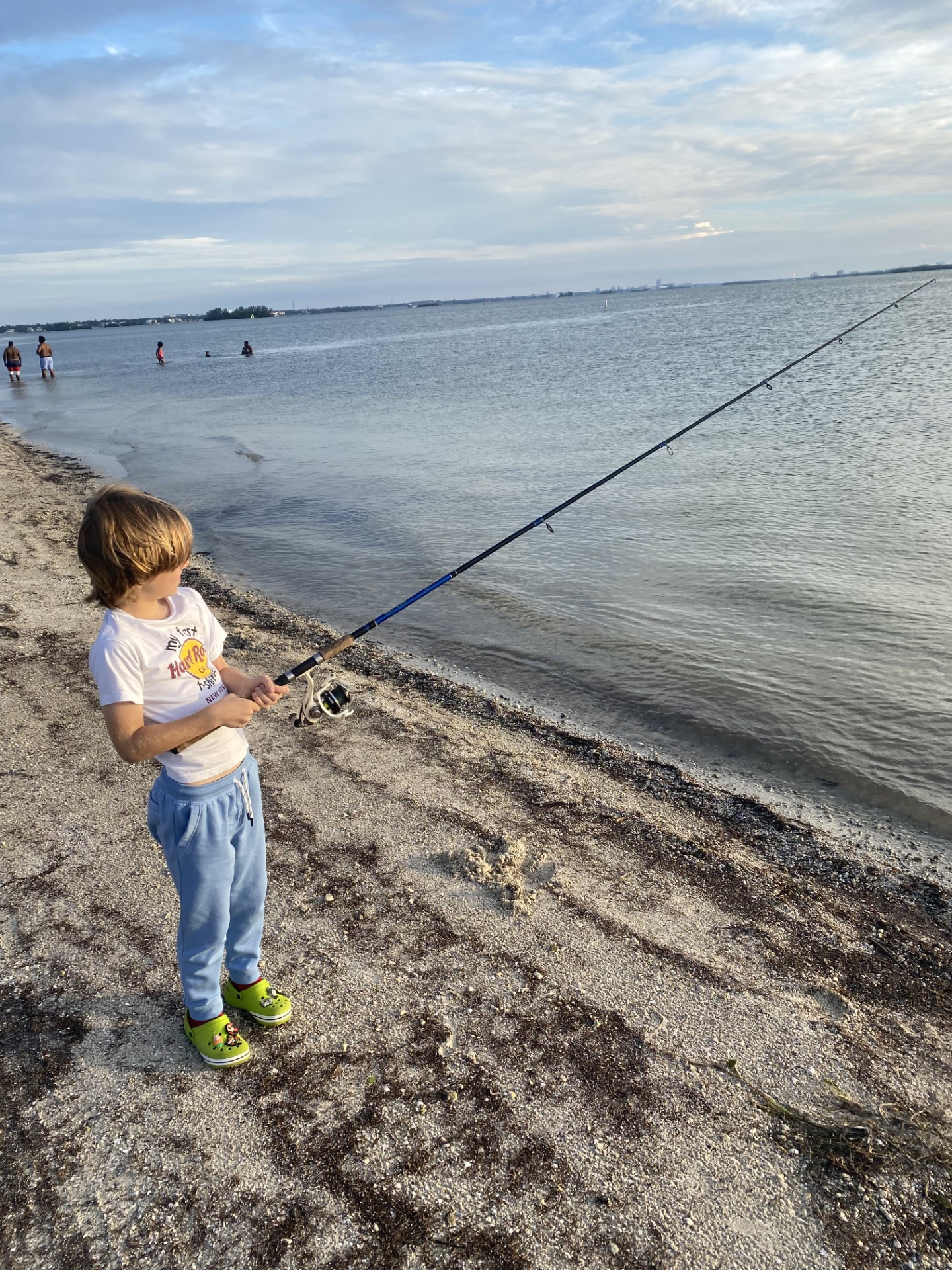 Young angler fishing the Clearwater shoreline